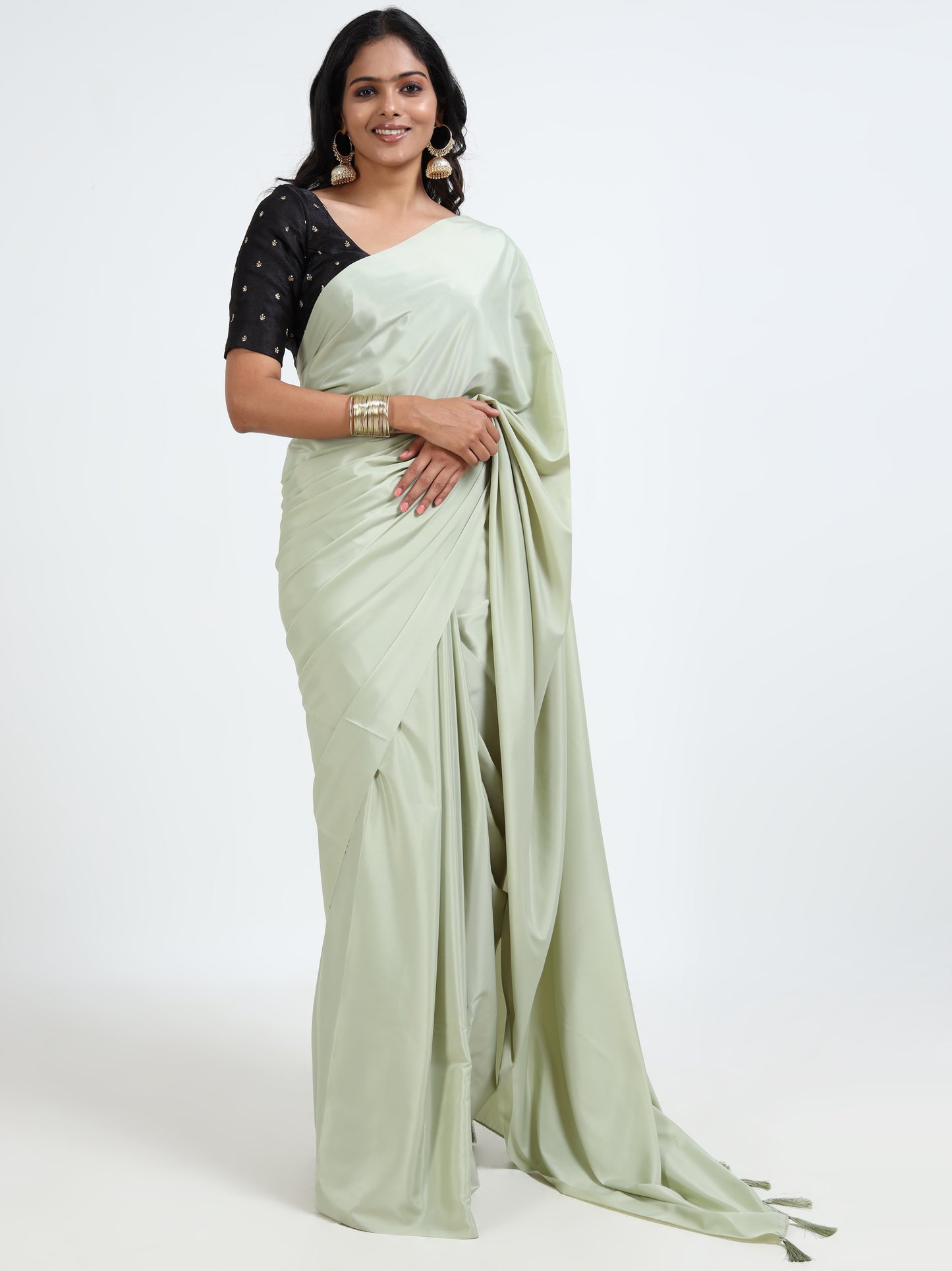 Panache Green silk saree with matching unstitched blouse