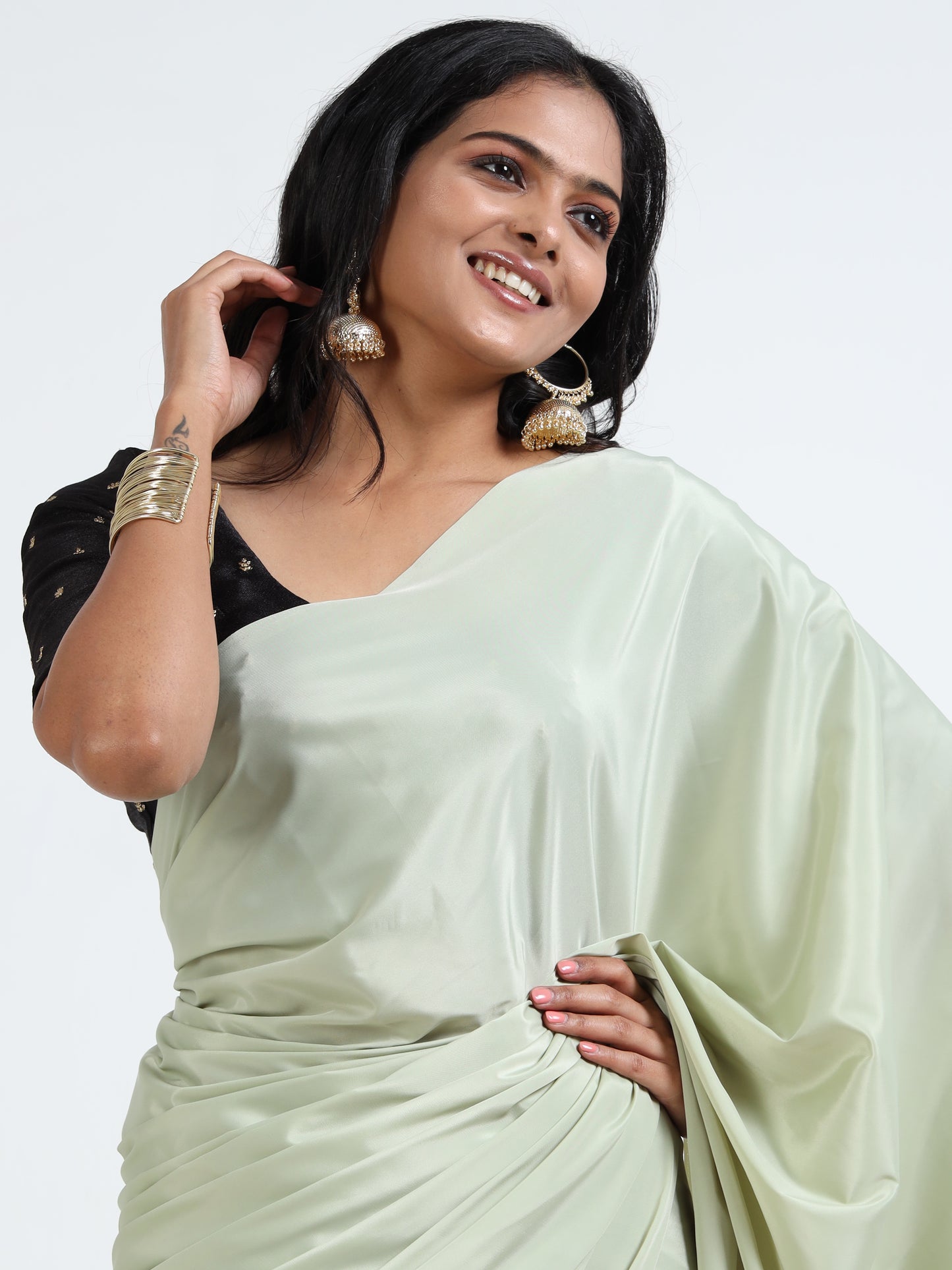 Panache Green silk saree with matching unstitched blouse