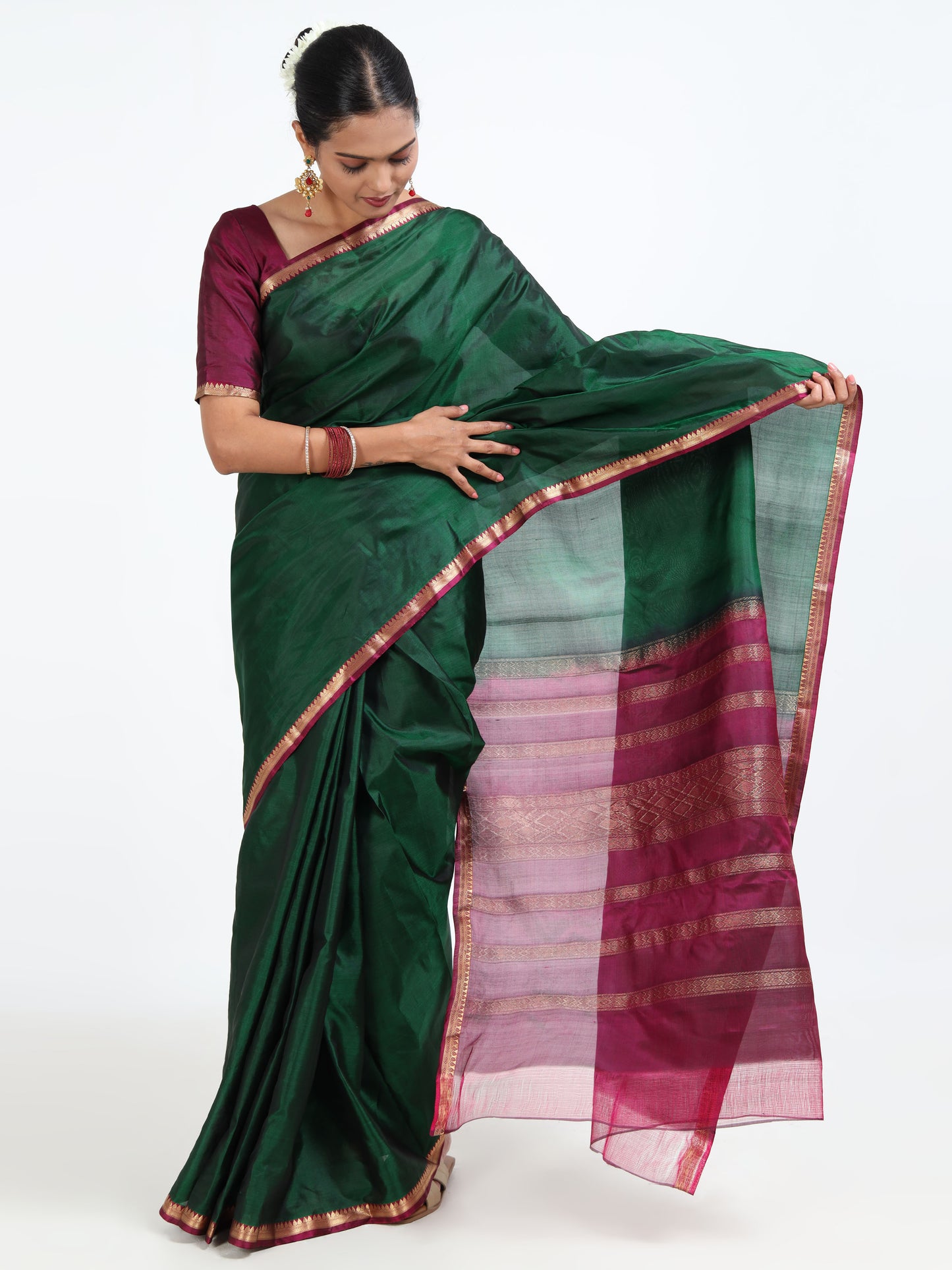 Fir Green silk saree with matching unstitched blouse