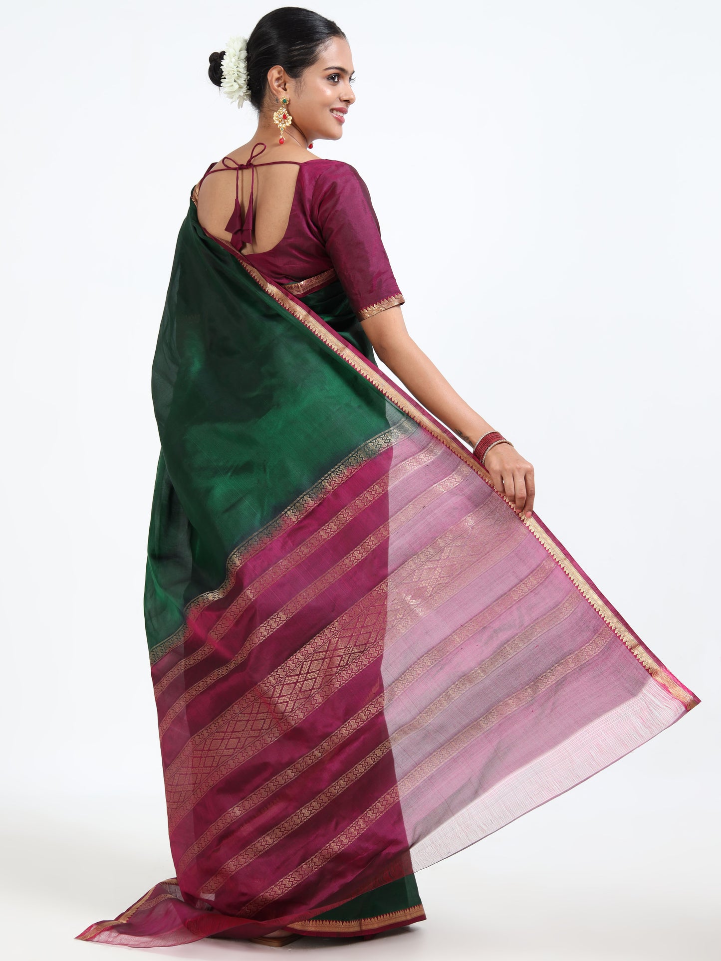 Fir Green silk saree with matching unstitched blouse