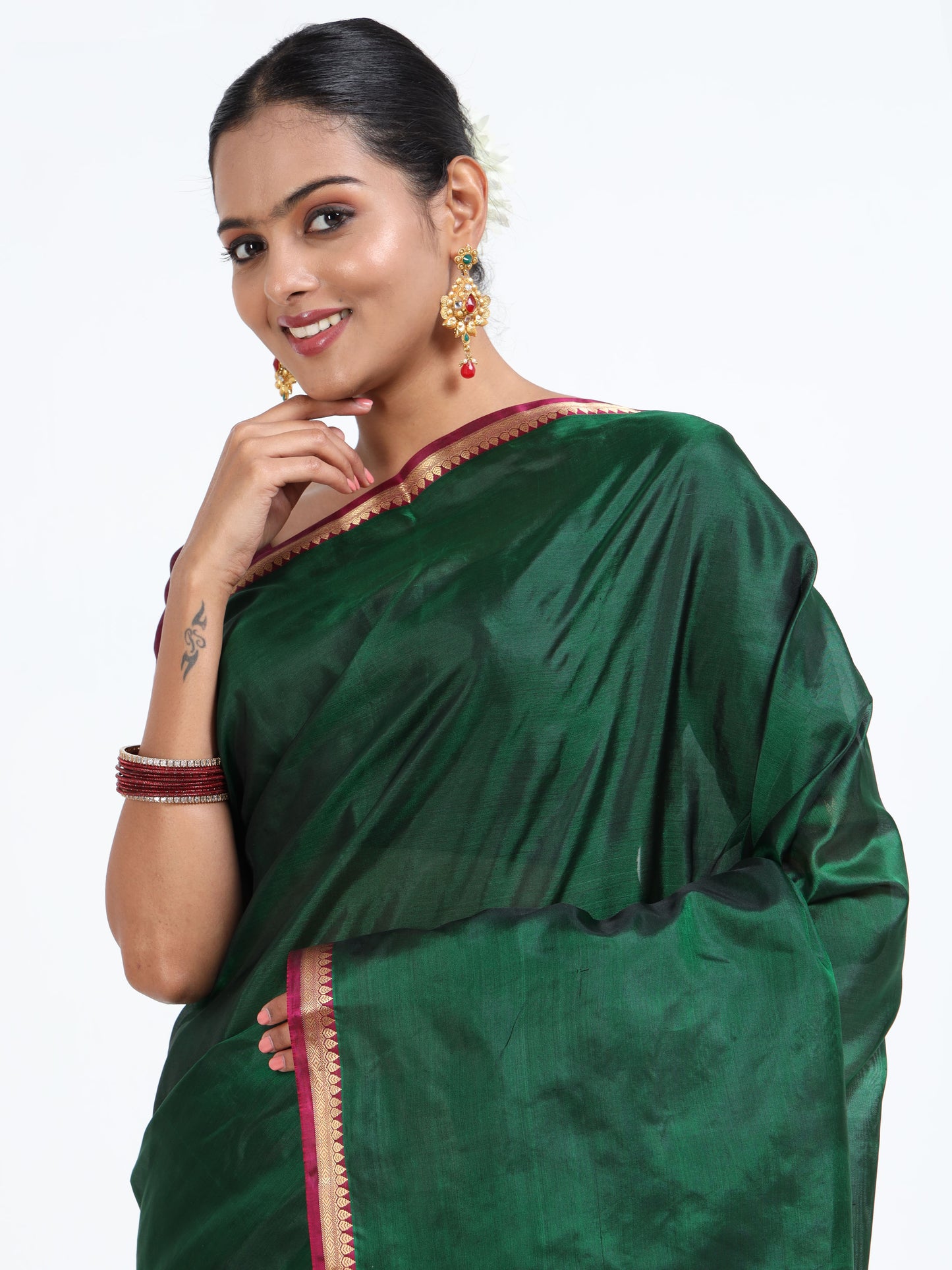 Fir Green silk saree with matching unstitched blouse