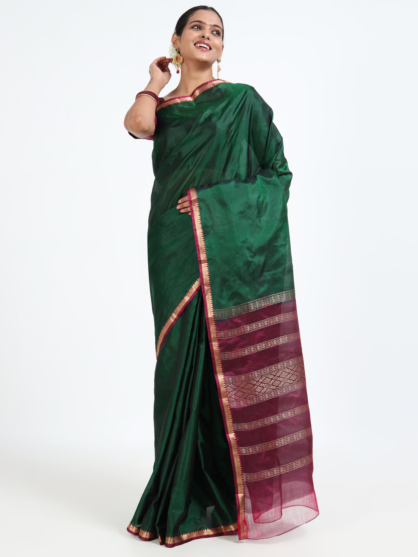 Fir Green silk saree with matching unstitched blouse