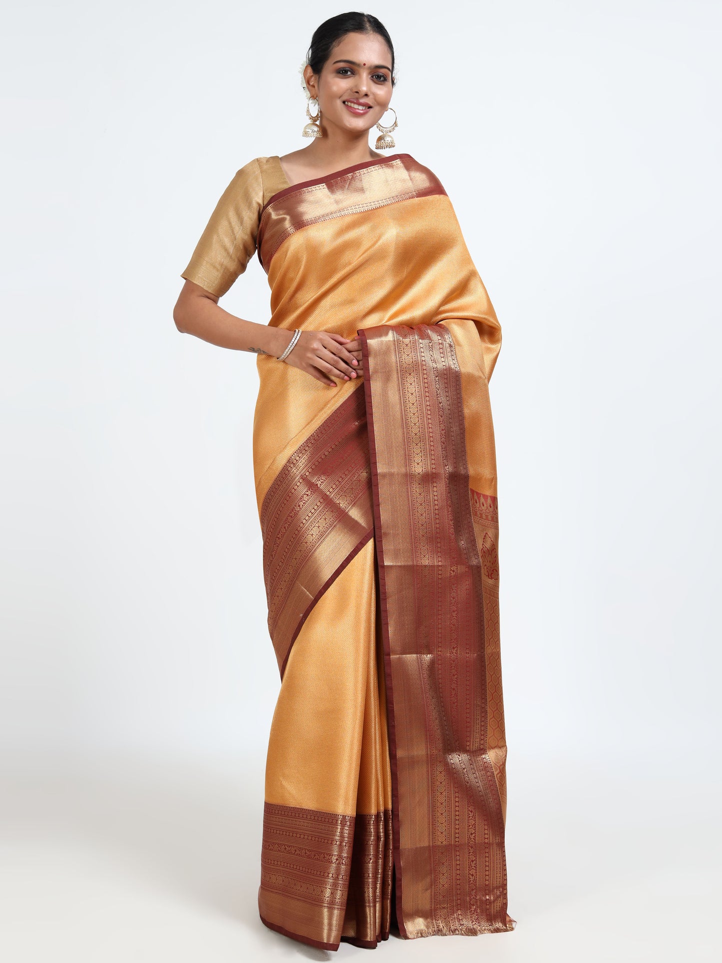 Saffron orange silk saree with matching unstitched blouse