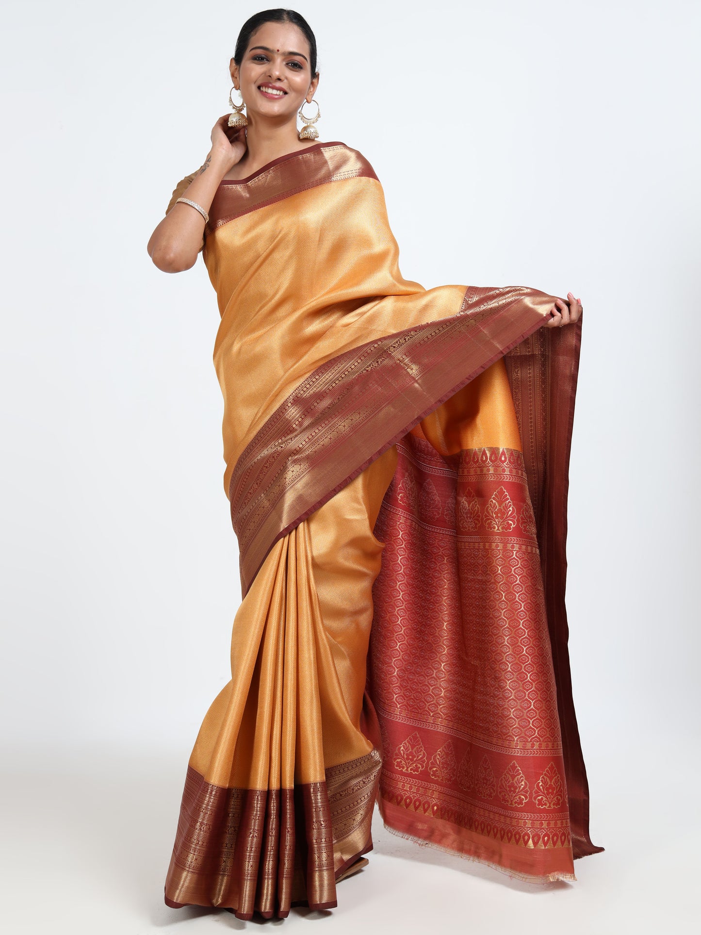 Saffron orange silk saree with matching unstitched blouse