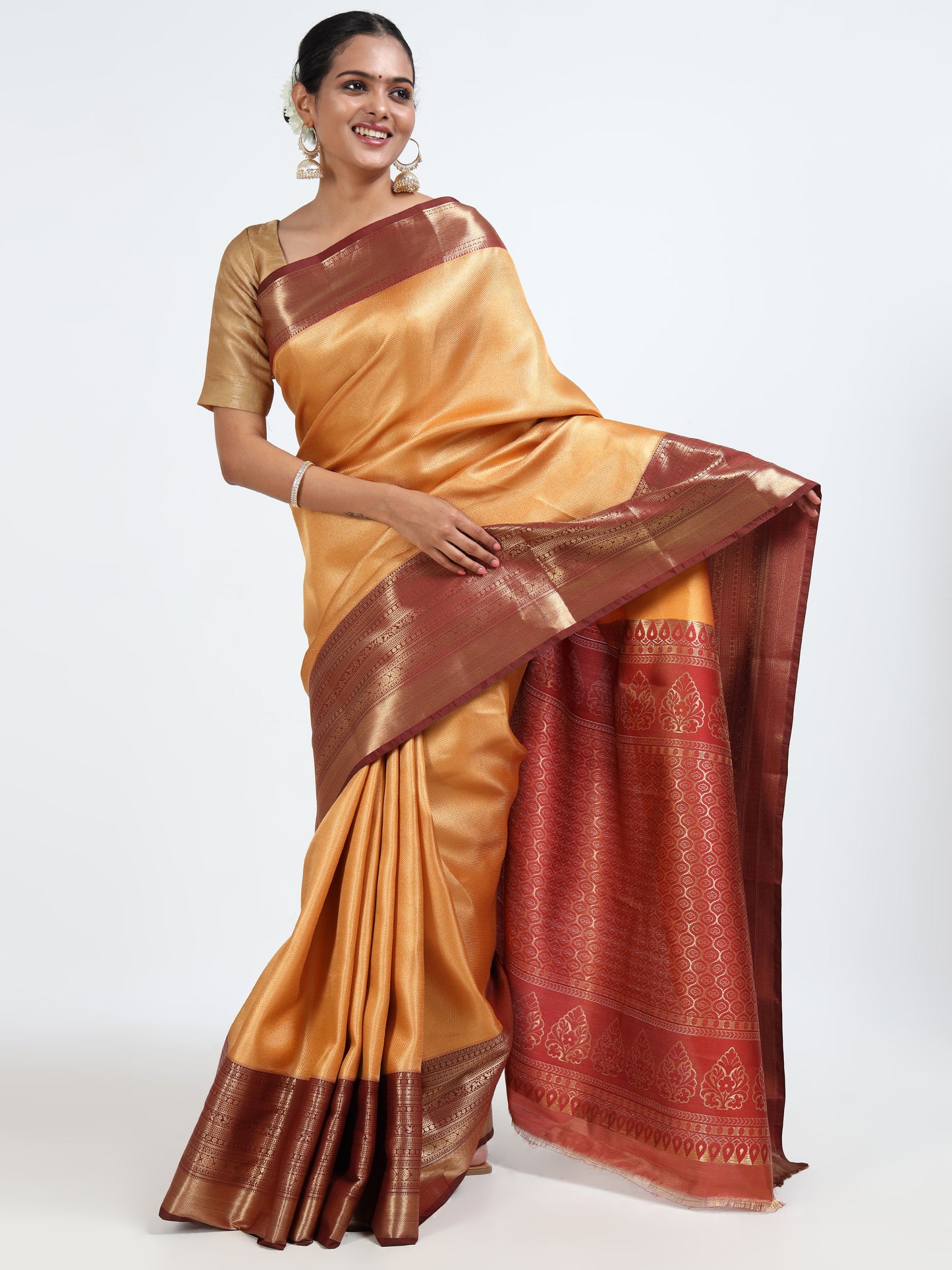 Saffron orange silk saree with matching unstitched blouse