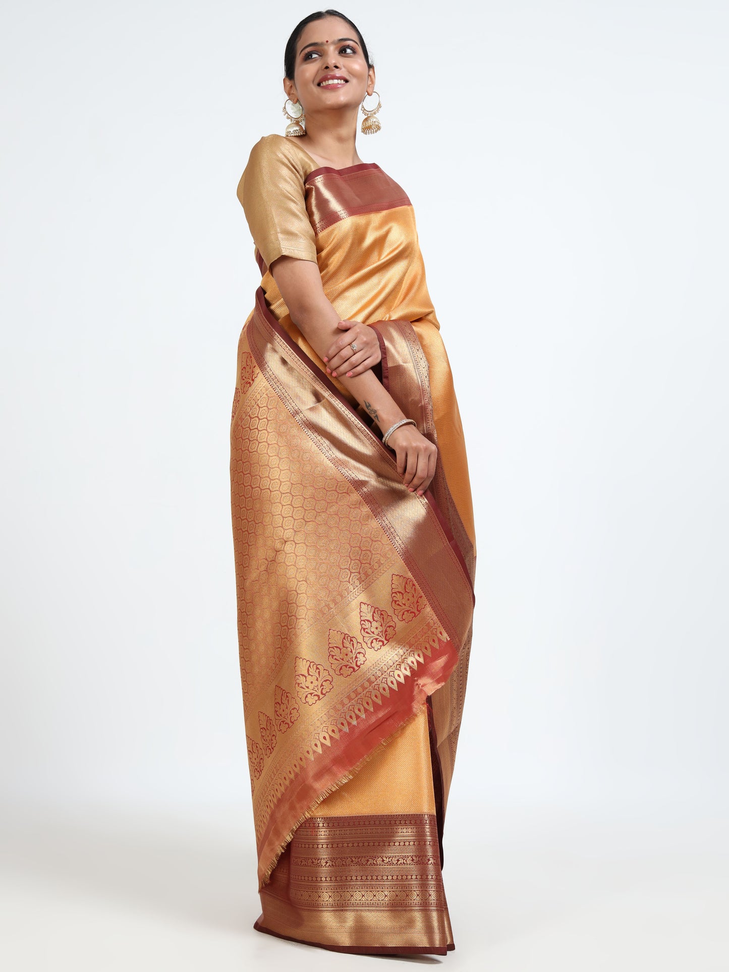 Saffron orange silk saree with matching unstitched blouse