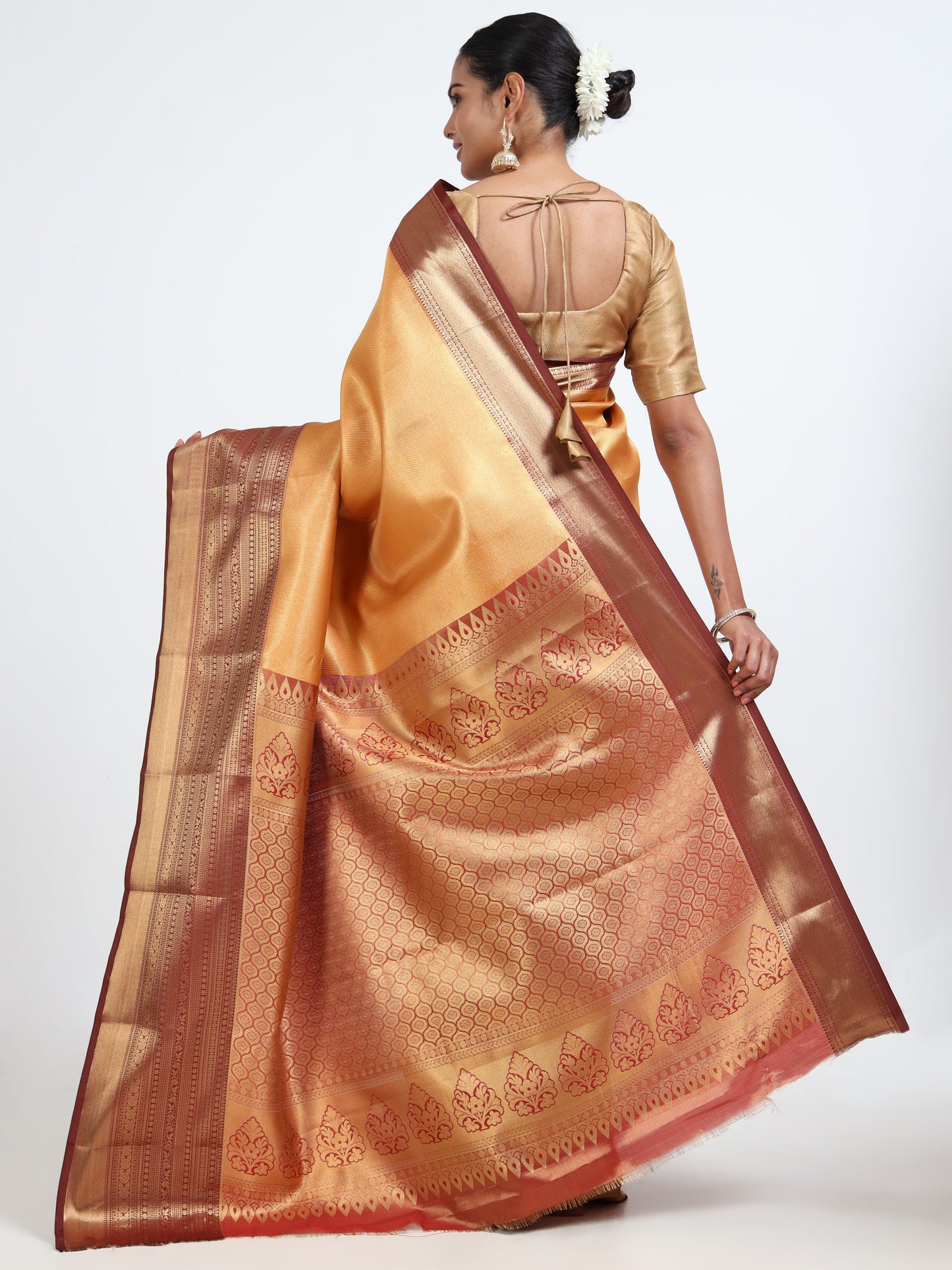 Saffron orange silk saree with matching unstitched blouse