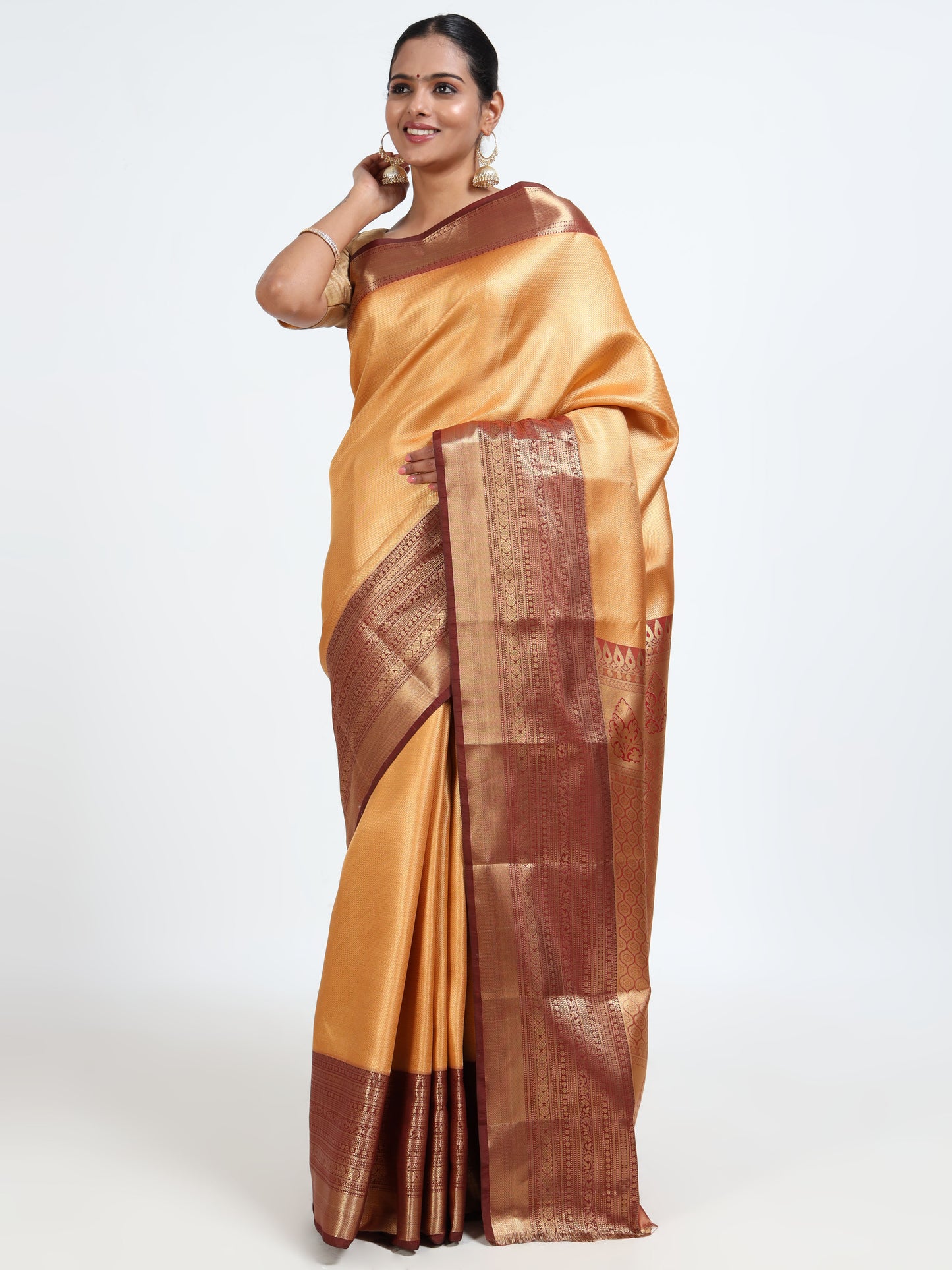 Saffron orange silk saree with matching unstitched blouse